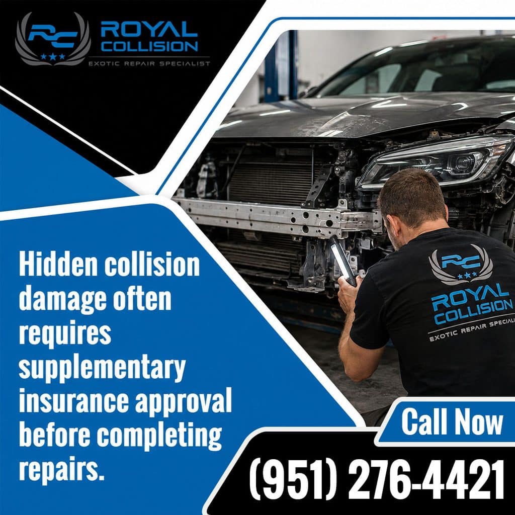 Exotic collision repair technician using an inspection light to assess structural front-end bumper frame damage on a modern car.