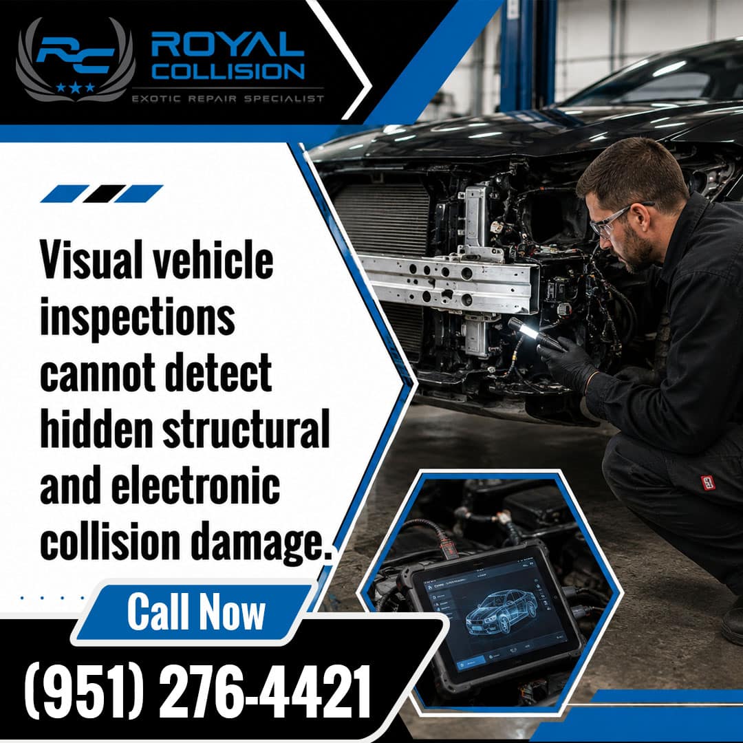 Auto collision technician using an inspection light on exposed front bumper framing beside an electronic diagnostic scan tablet.